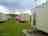 Golden Anchor Caravan Park: Outside the holiday home