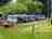 Country Lane Campground and RV Park: Photo from back of park of a group of Airstreams