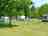 Camping La Garenne: Pitches surrounded by trees