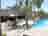 Rooisand Desert Ranch: The pool and lapa restaurant/bar area