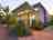 BIG4 Breeze Holiday Parks – Busselton: Exterior of the bungalow lit at night 