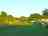 Green Haven Camping: Enjoying the evening sunshine - view across the site towards the shower block and facilities