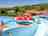 Camping des Bastides: View of the pool from the slide