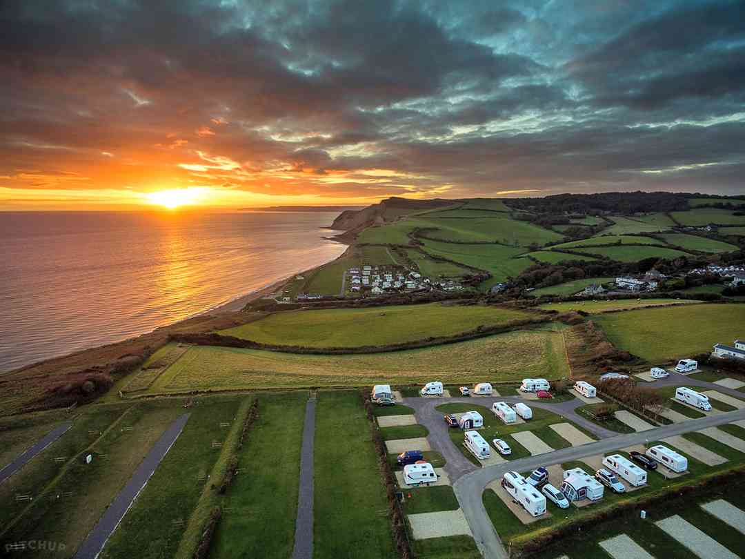 Highlands End Holiday Park: Aerial photo of the camping and touring field overlooking Eype beach (photo added by manager on 03/12/2021)