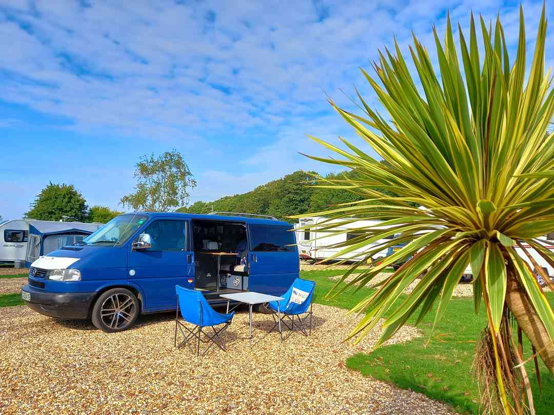 Portesham Dairy Farm Campsite: Level, well spaced pitches. Electric hook up and water on pitch.