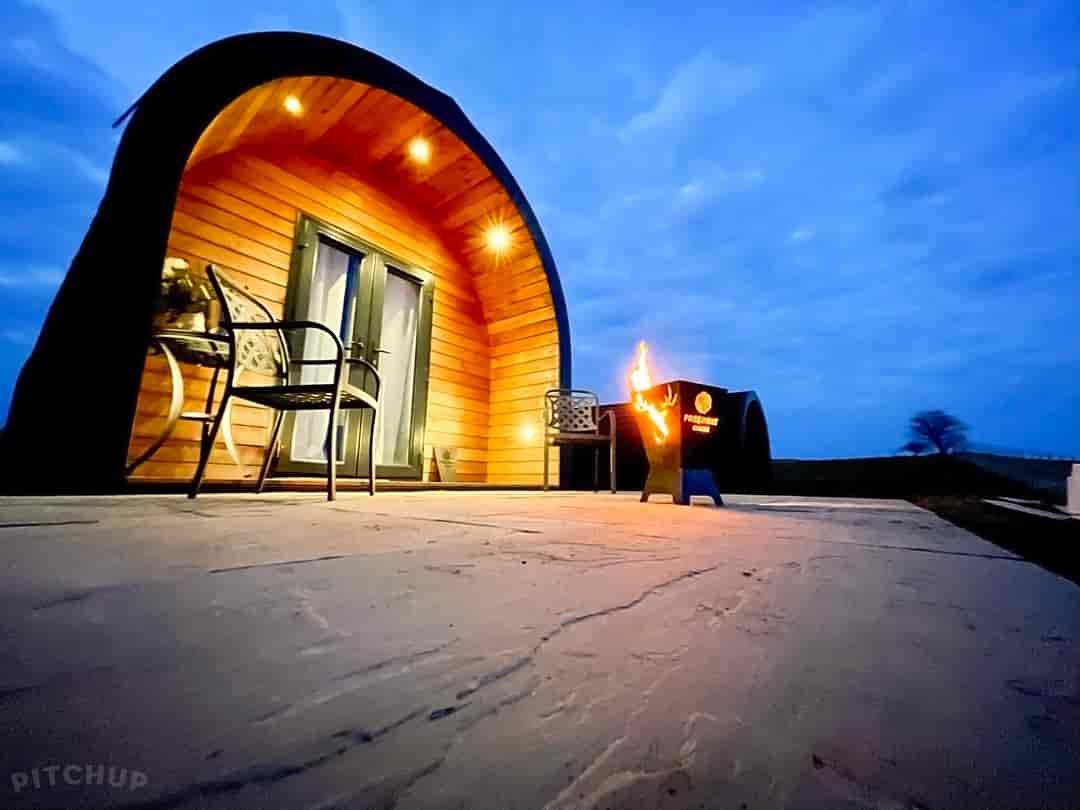 Fossoway Cabins: Pod lit up at night