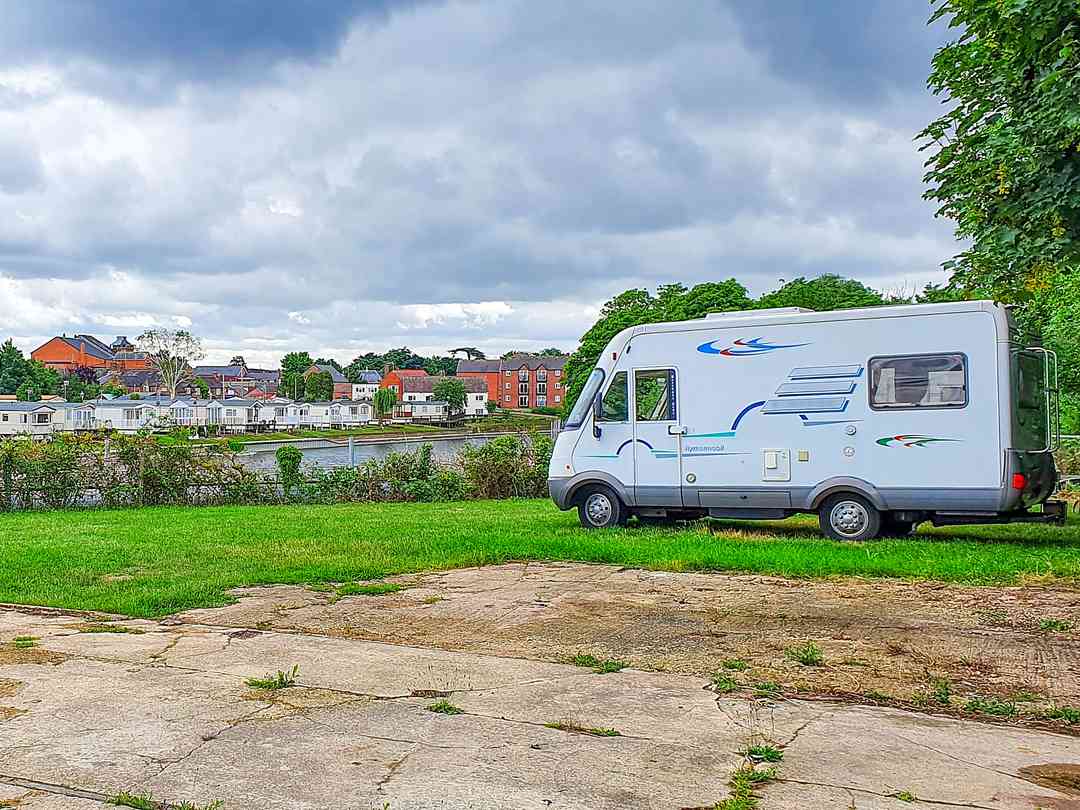 Evesham Caravan Site: Pitches over the river (photo added by manager on 08/09/2022)