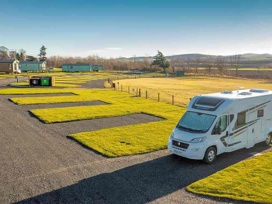 Coldstream Holiday Park: Gravel pitches for Tourers, Motorhomes and Campervans. Electric hook up available.