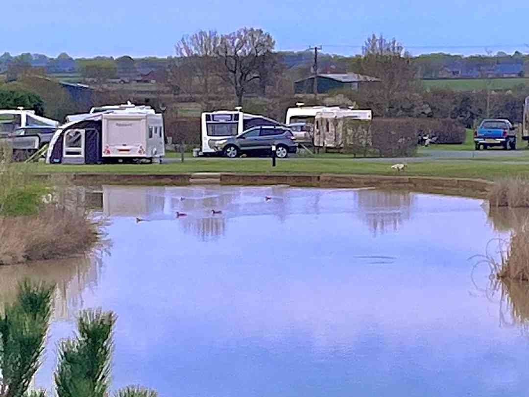 New Farm Cheshire Holidays: Lakeside pitches over fishing lake
