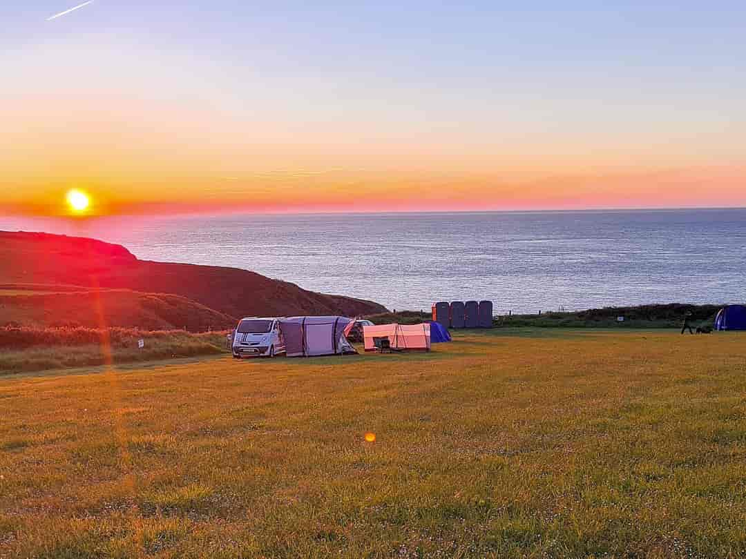 Celtic Camping: Sun setting over the Irish Sea