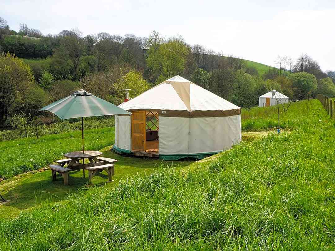 Rocombe Valley Retreat: Yurt and family yurt, tucked into the hill (photo added by manager on 14/04/2015)