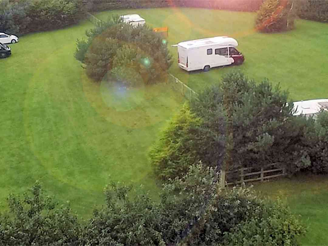 Corner House Caravan and Camp Site: Site aerial evening sunset photo 2021