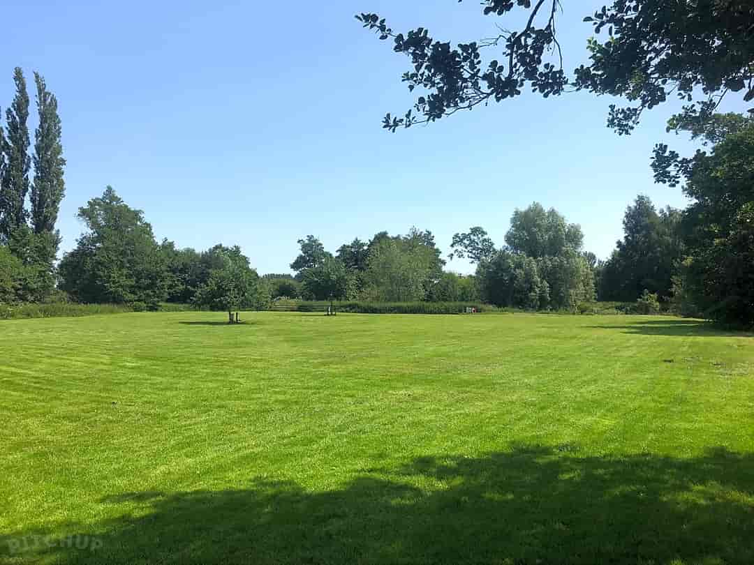 The Leen Caravan and Camping Site: One-acre grass site with riverside pitches