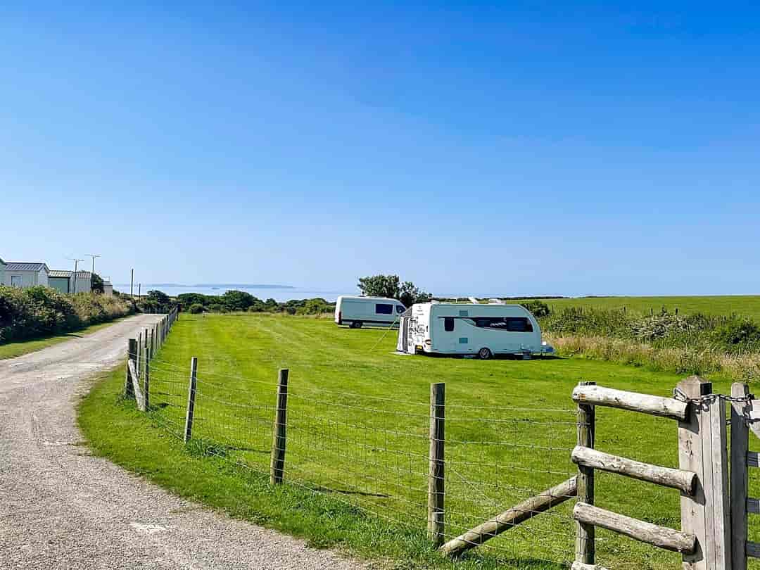 Llanungar Caravan and Camping: View of the 'Paddock' - grass pitches without electric
