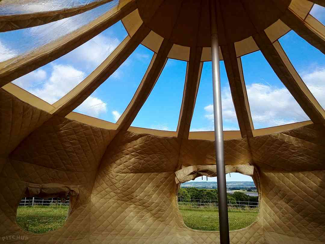 Forest Glamping Retreat: Luxury lined 6m Stargazer looking out onto view of field and River Severn