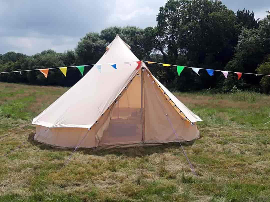 Forest Edge: Bell tent with bunting