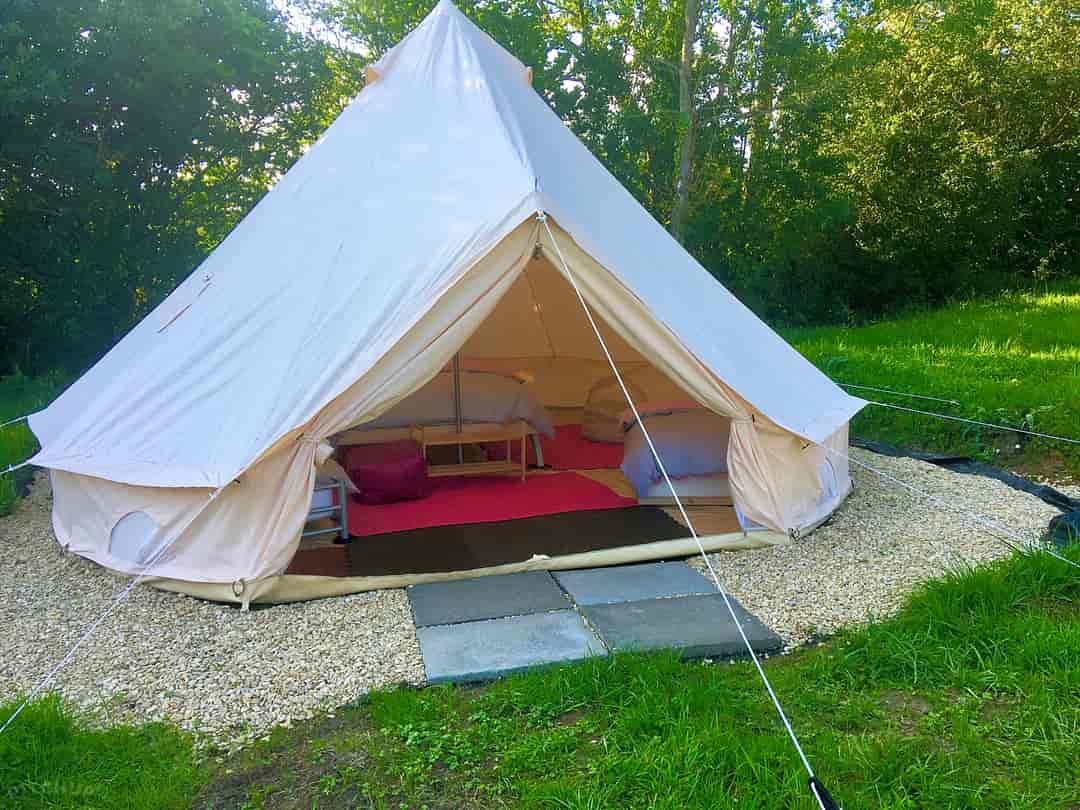 Pixie Bell Tents: The bell tents have a two-layer zip door