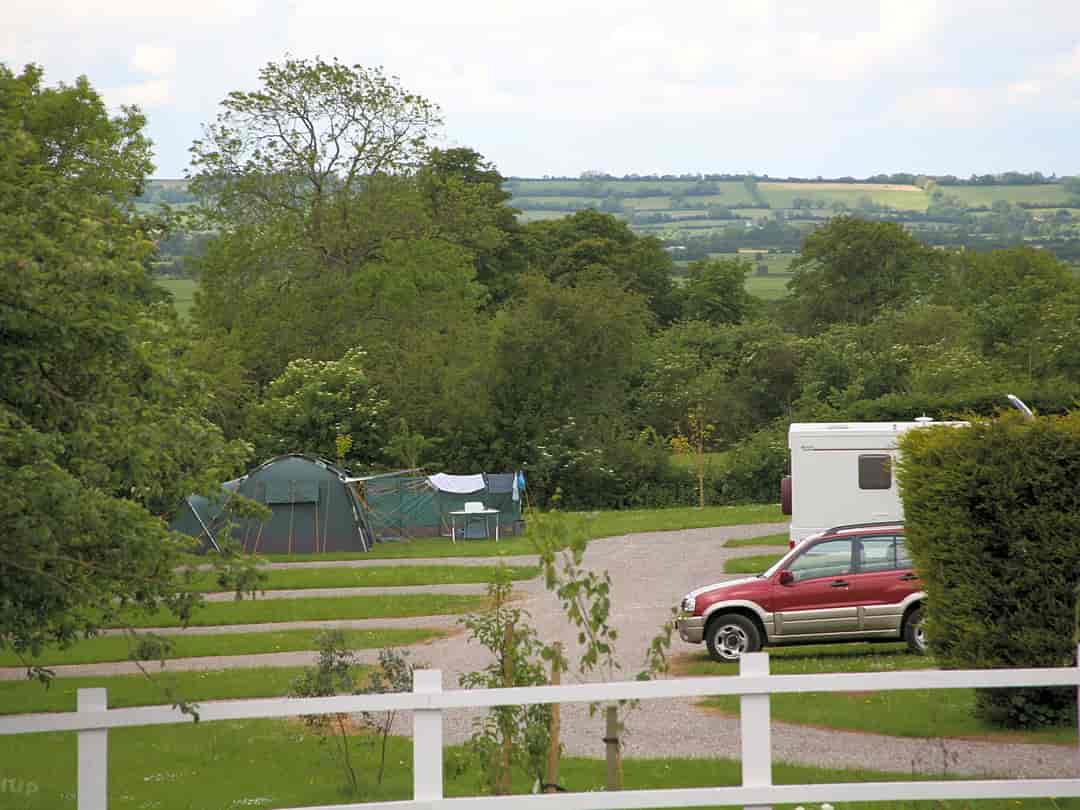 The Rodney Stoke Caravan and Camping Park: Mixed pitches – a bit of grass and a bit of gravel