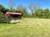 Premier pitch with private kitchen, private kitchen, toilet and shower amenities