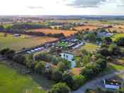 Countryside site beside a pub and railway lots of wildlife in surrounding fields