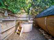 The wood-fired hut tub is very popular in the Owl pods.