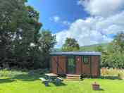 External fire pit and picnic bench.