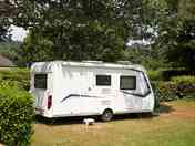 Our spacious pitches are separated by high hedges.