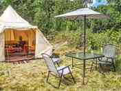 Wide porch and an outdoor space at the boho tent