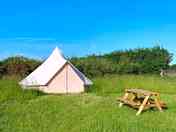 Bell tent with picnic table