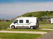 hardstanding with grass.