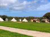 Looking at the bell tents and camping pods.