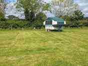 Grass pitches suitable for trailer tents and motorhomes