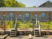 View of stable cabins Lapwing, Linnet and Skylark