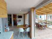 Spacious living area leading on to decking