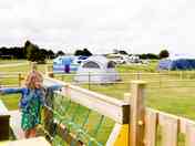 Grass tent and trailer tent pitch with electric and play area