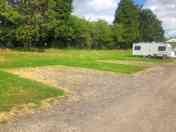 Electric hard standing and grass touring pitch