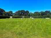 Grass tent pitch with electric