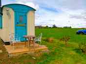 Park next to your hut with neighbours 50-100 metres away