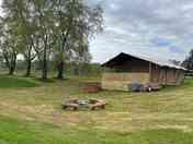 The Birches two-bedroom safari tent with woodfired hot tub and firepit