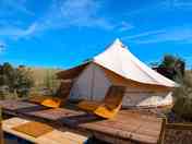 Terrace seating outside the bell tent