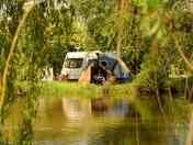 Pitches tucked away by the river