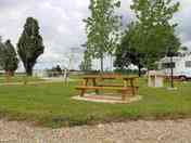 Grass pitch with picnic table