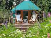 Yurt exterior with seating (added by manager 17 Feb 2023)