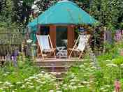 Yurt exterior with seating