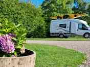 Large gravel touring pitch with electric hook up