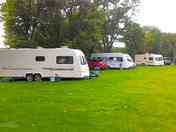 Electric hardstanding and grass pitch