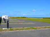 Fully serviced gravel pitches with sea and river views