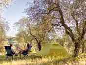 Tent pitch with Tuscan hill views