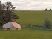 The Sage and Rose tent with its own barbecue and picnic table