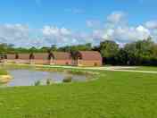 Grass touring/tent pitches by the lake
